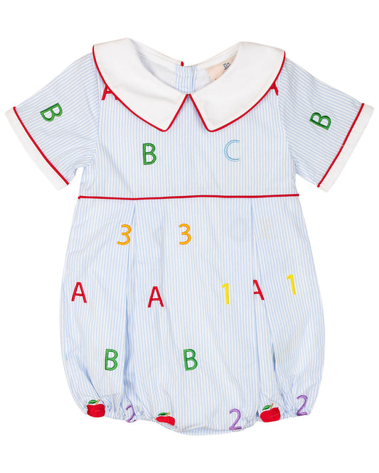 Baby romper with colorful letters and numbers on a white background