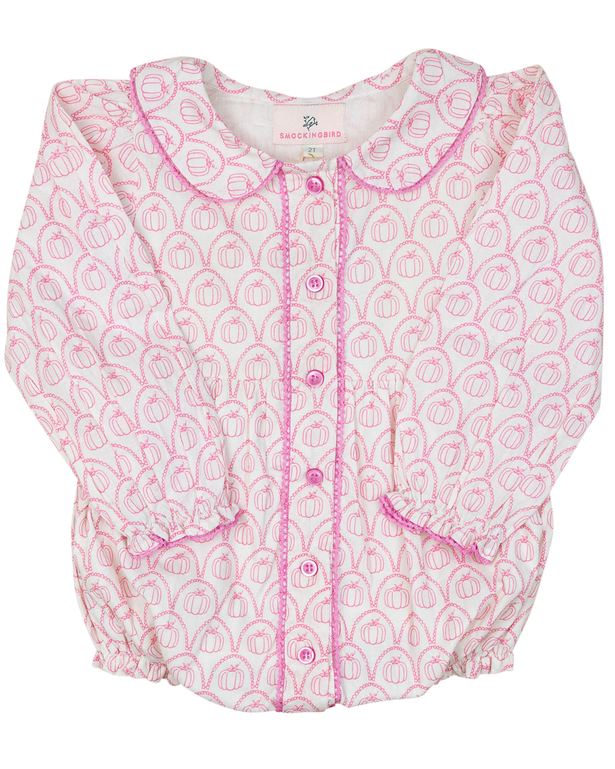Baby romper with pink and white pumpkin pattern on a white background