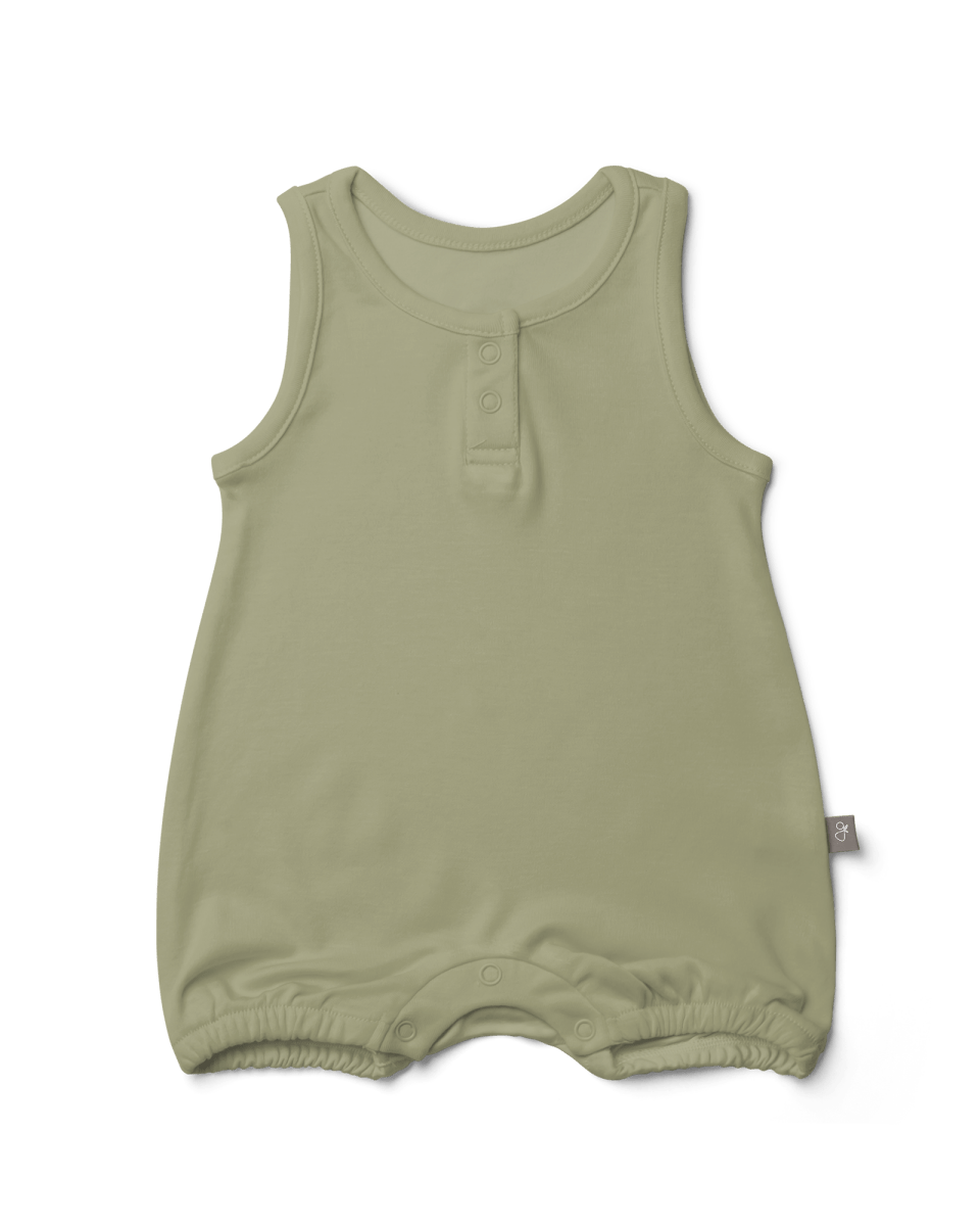 Beige baby romper with button details on a transparent background