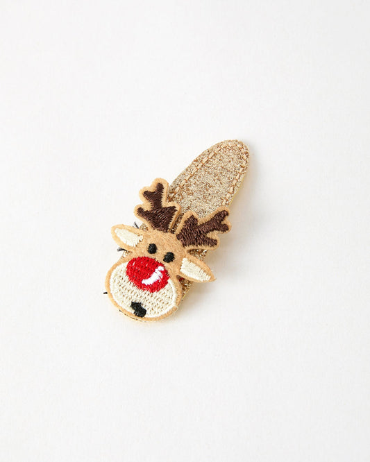 Embroidered reindeer patch on a white background