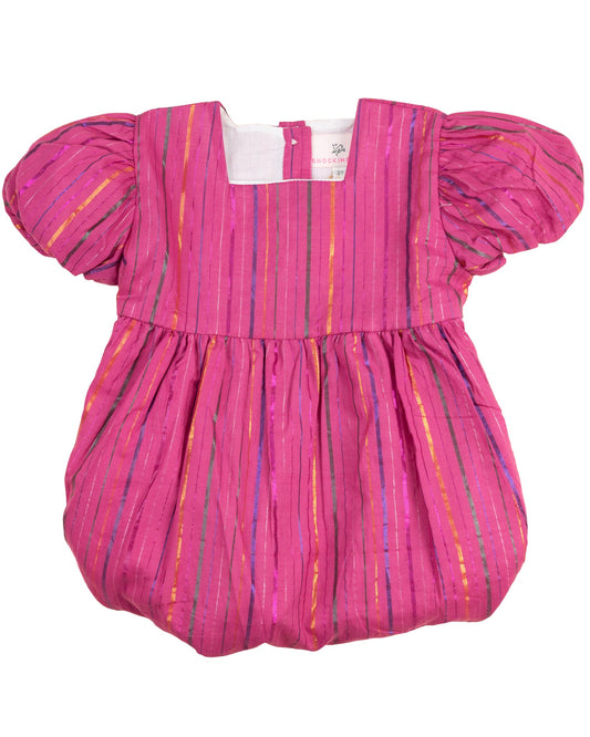 Pink dress with colorful stripes on a white background