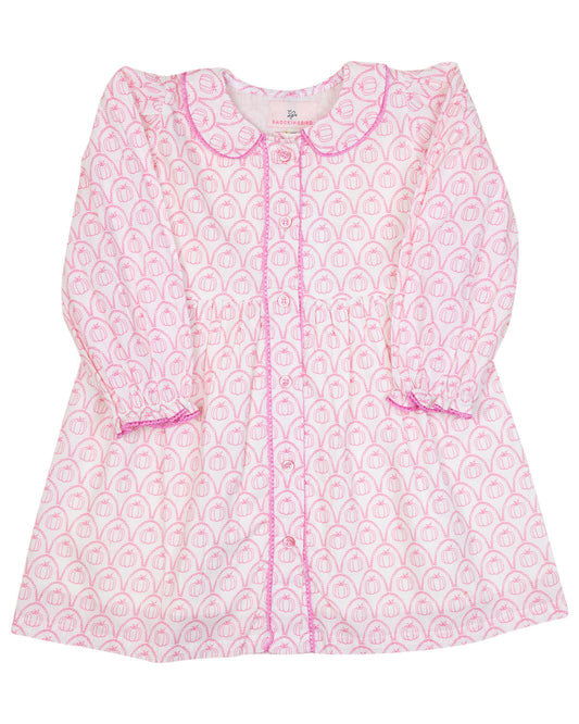Pink and white patterned baby coat on a white background