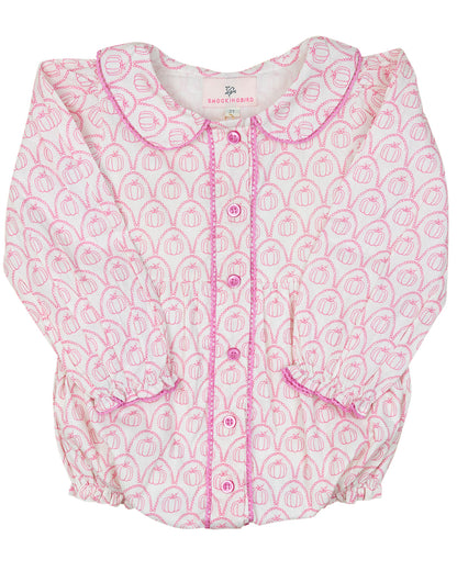 Baby romper with pink and white pumpkin pattern on a white background