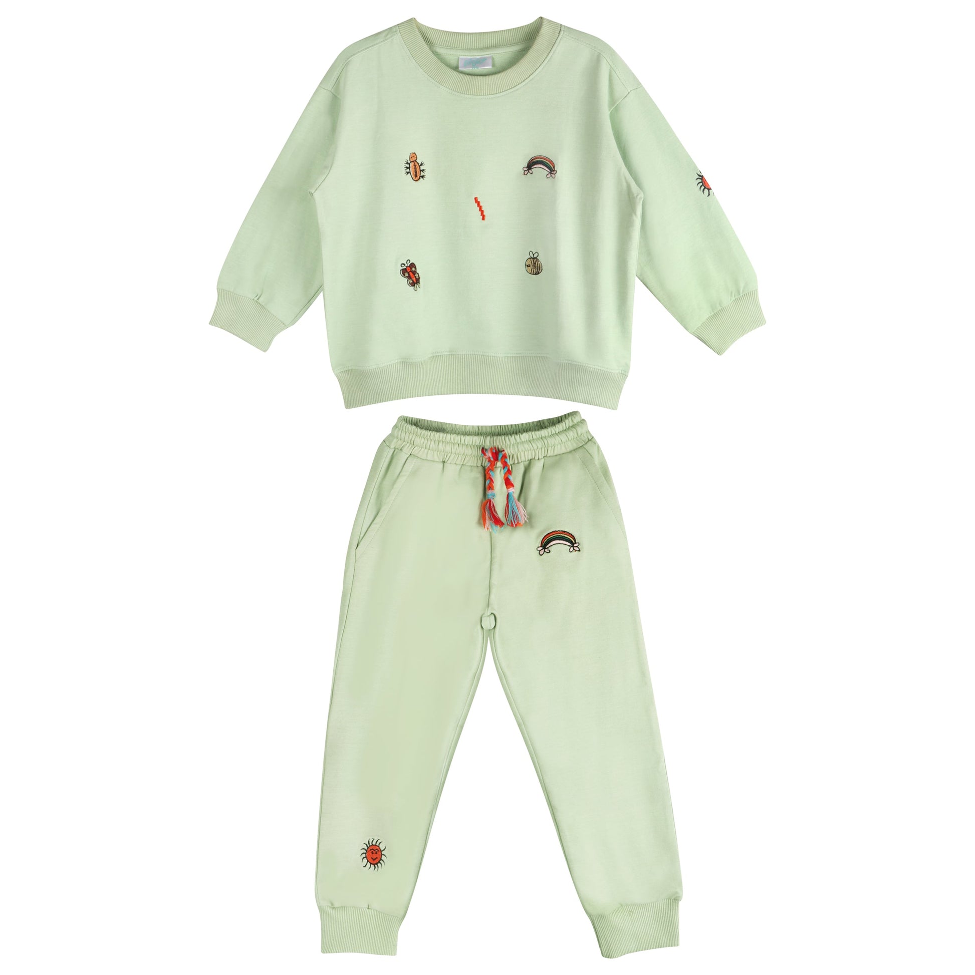 Light green children's sweatshirt and pants set with embroidered designs on a white background
