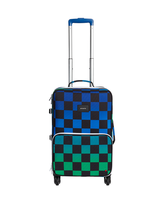 Checkered suitcase with blue and green pattern on a white background