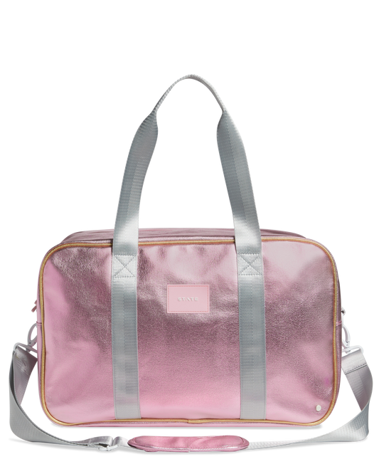 Pink metallic duffel bag with silver straps on a white background