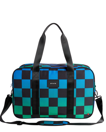 Checkered duffel bag with black straps on a white background