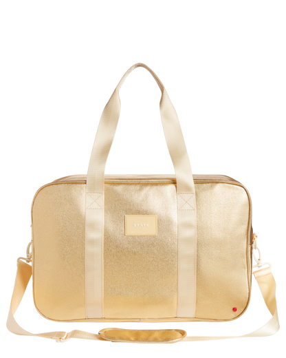 Gold duffel bag with a visible brand label on a white background