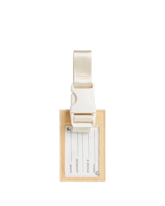 Luggage tag and white strap on a white background