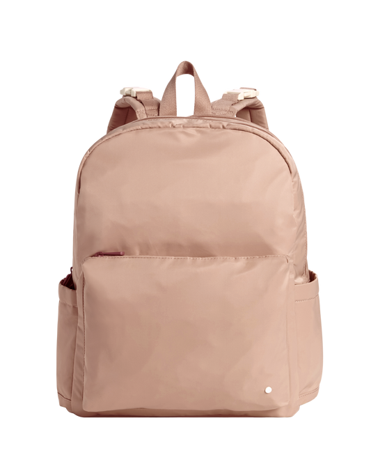 Beige diaper backpack on a white background