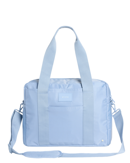 Light blue diaper bag with a visible state bag logo on a white background