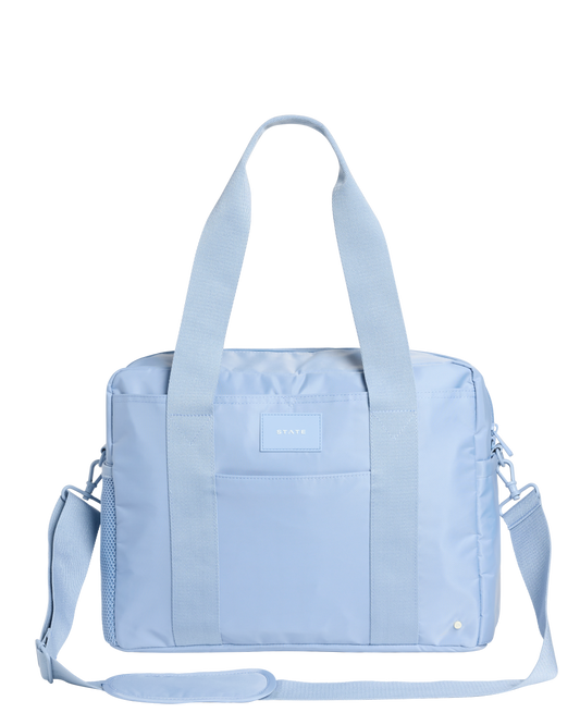 Light blue diaper bag with a visible state bag logo on a white background