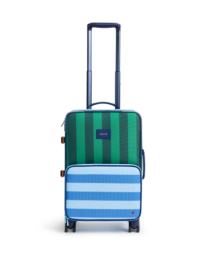 Green and blue striped suitcase on a white background